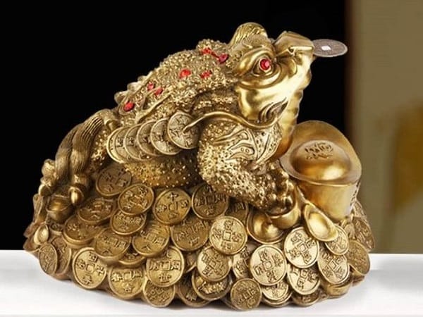 Ý nghĩa phong thủy của cóc ngậm tiền